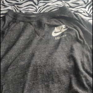 A crew neck long-sleave top